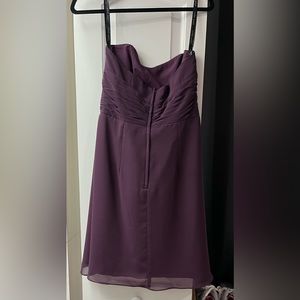 This was a size 10 but was altered- bust is 36”. It is wine colored!